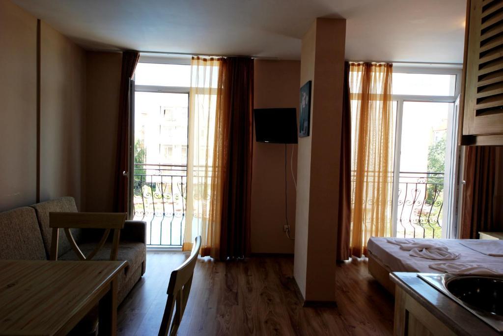 Menada Dawn Park Apartment Pantai Sunny Ruang foto